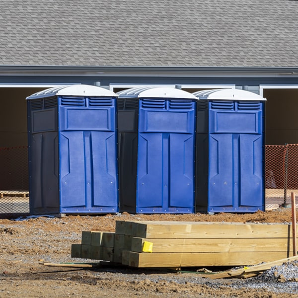 what is the cost difference between standard and deluxe portable restroom rentals in Hainesville IL